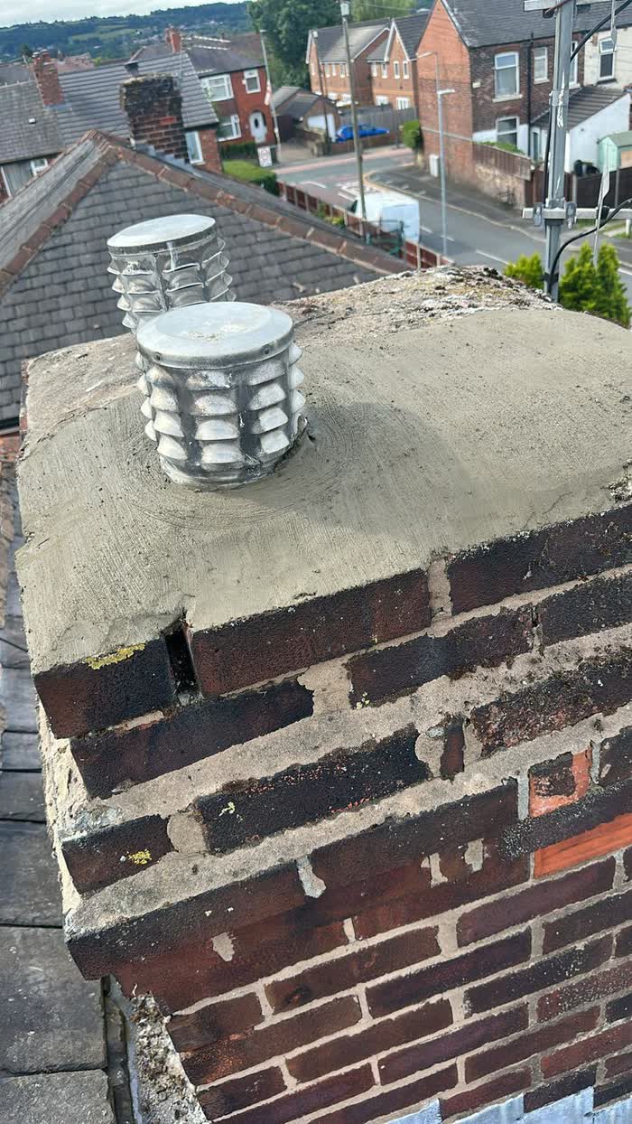 Chimney stack re-flaunched with new cowls fitted to the pots